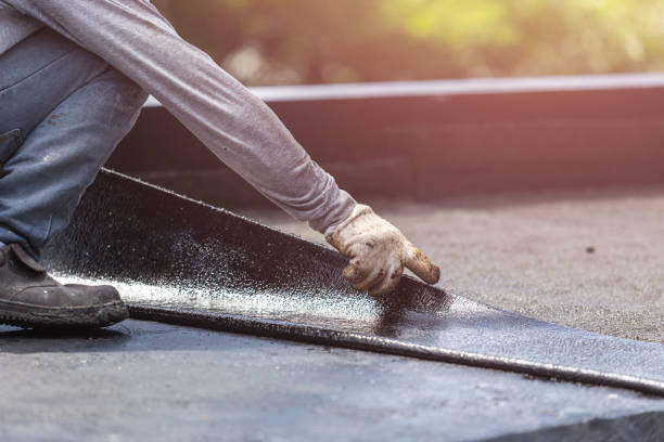 Professional Basement Waterproofing technician working in Albion, NY